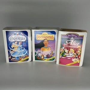 Alice in wonderland, Pocahontas, and Cinderella McDonald’s VHS toys